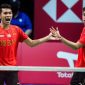 Indonesia's Fajar Alfian and Muhammas Rian Ardianto (R) react after winning a point during their men's s double match against China's He Ji Ting and Zhou Hao Dong (Both unseen) during the Thomas Cup men's team final match between China and Indonesia in Aarhus, Denmark, on October 17, 2021. (Photo by Claus Fisker / Ritzau Scanpix / AFP) / Denmark OUT