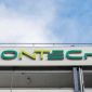 (FILES) In this file photo taken on March 27, 2021 the logo on the facade of the new manufacturing site of German company BioNTech for the production of the Covid-19 vaccine is seen in Marburg, central Germany. - Covid jab maker BioNTech said on Mai 10, 2021 it would build a Southeast Asia headquarters and manufacturing site in Singapore to produce hundreds of millions of mRNA-based vaccines per year, with construction of the site starting this year to become operational by 2023. (Photo by Thomas Lohnes / AFP)
